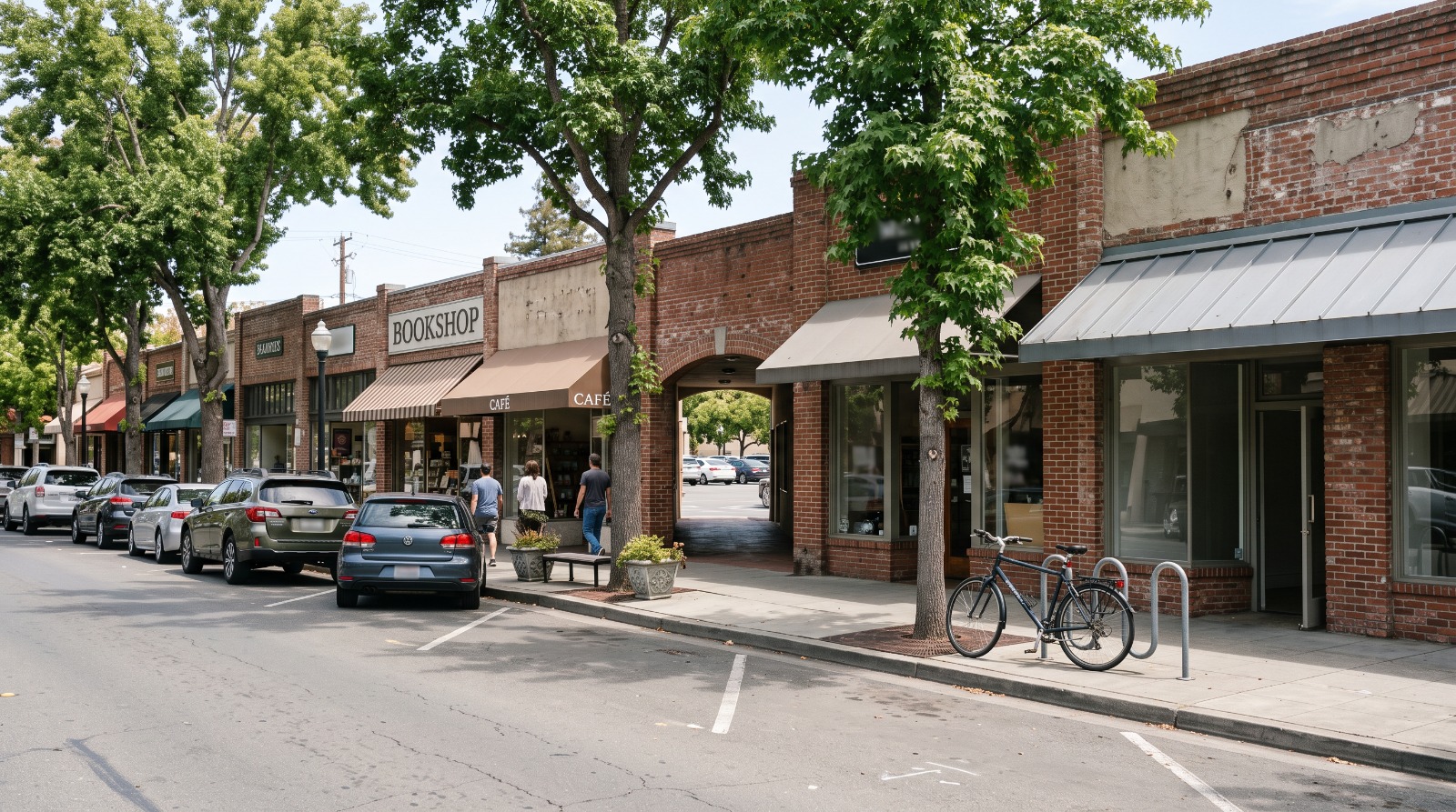 Downtown Los Altos retail street with a public parking plaza behind the shops