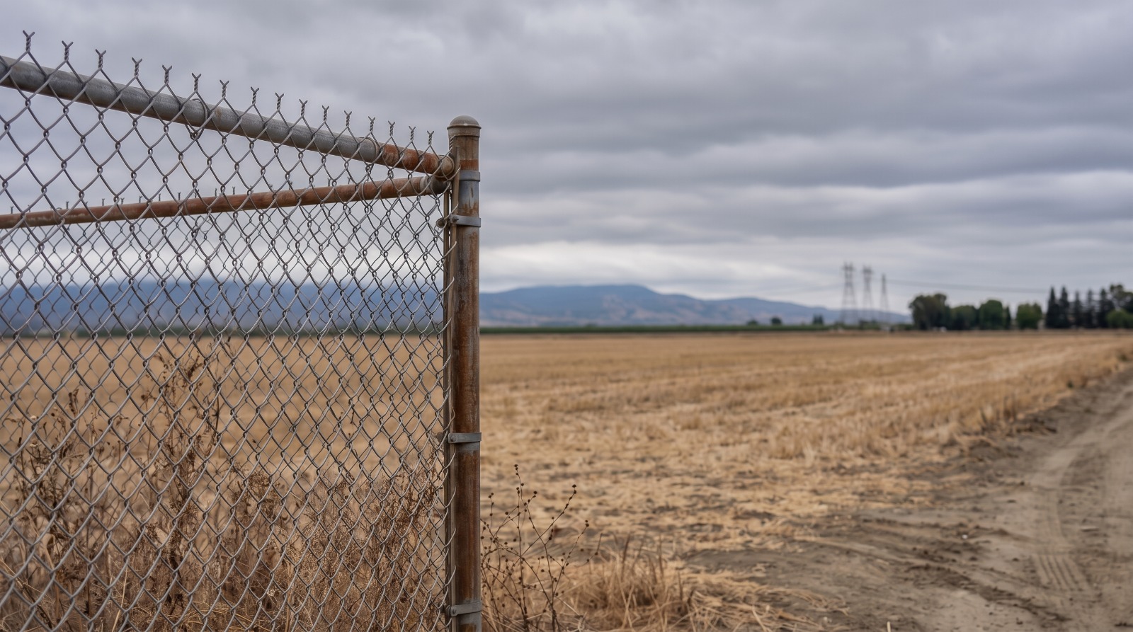 AI-rendered view of vacant land near Highway 152 and Camino Arroyo in Gilroy, where a second data center was proposed before the city's pause