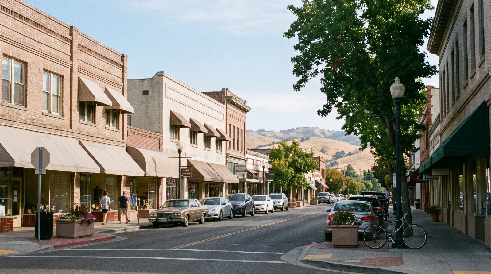Brick storefronts and street parking along First Street in downtown Livermore, California