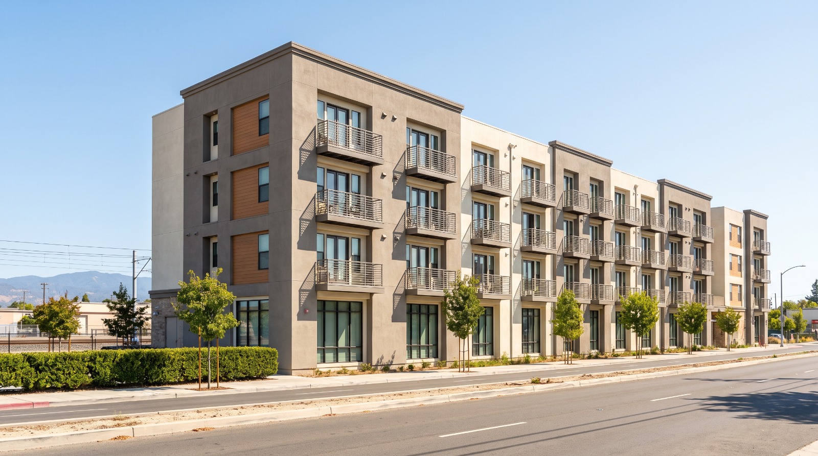 A modern mid-rise apartment building on Stockton Avenue near The Alameda in San Jose, where a 250-unit complex sold for $140 million.