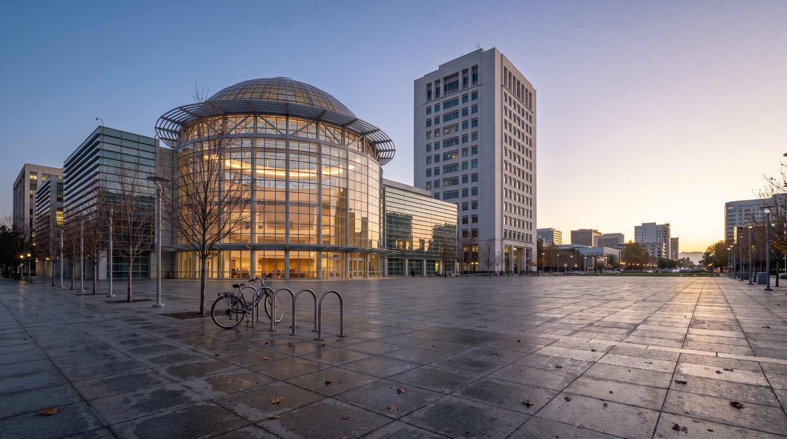 San Jose City Hall rotunda at dawn over an empty plaza, where the city announced its new homeless count methodology.