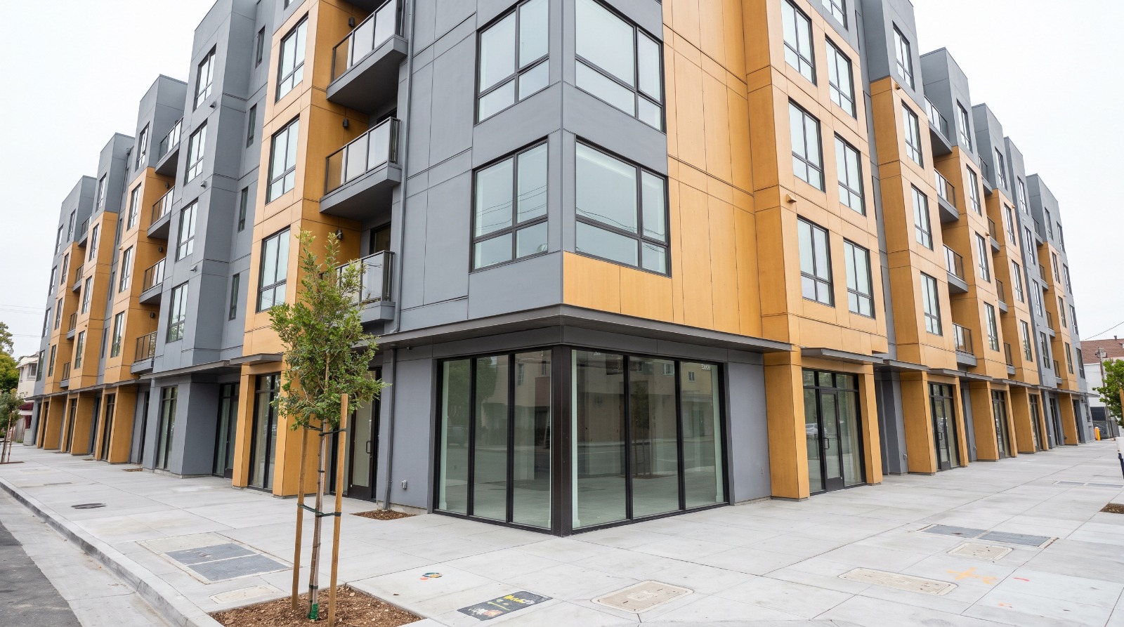 A recently built six-story mixed-use apartment building in Uptown Oakland, California