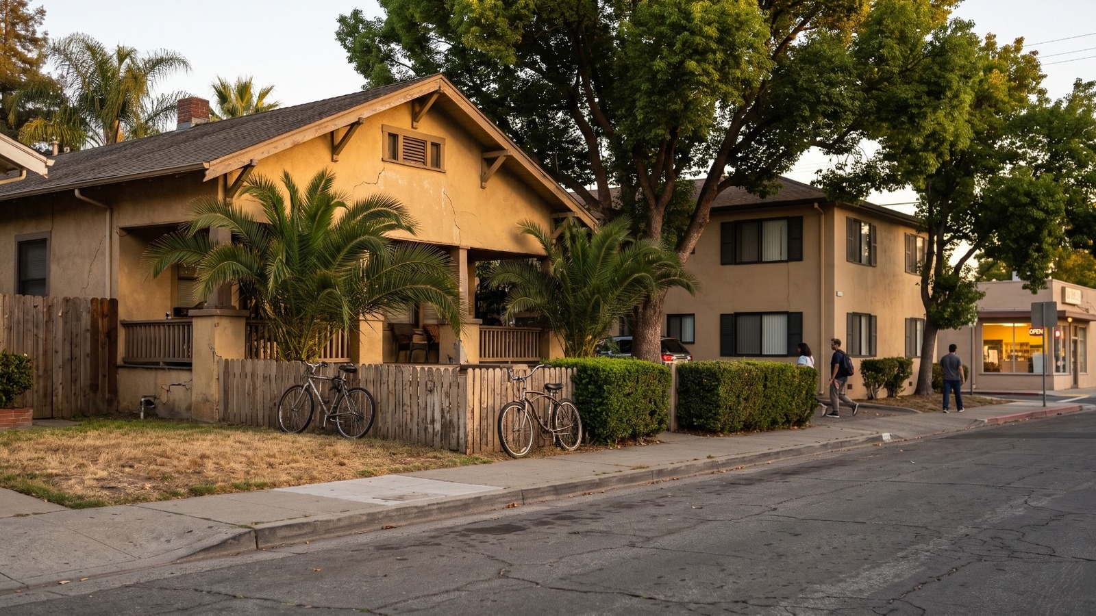 A bungalow block with bikes and a corner storefront beside Santa Clara University, one of the Bay Area campus neighborhoods in our scoring.