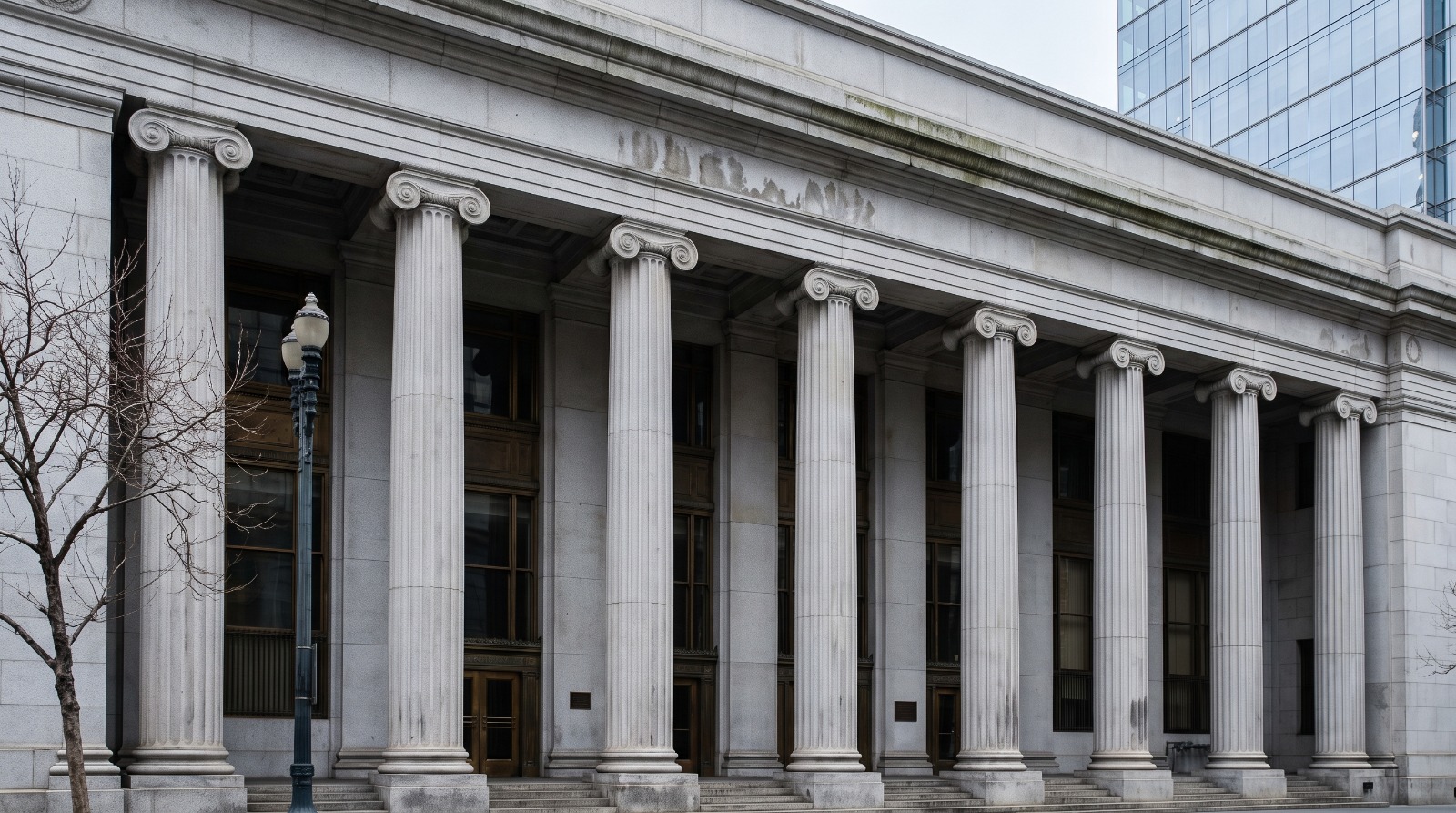 AI-rendered detail of the Ionic colonnade of the old Federal Reserve Bank building on Sansome Street in San Francisco