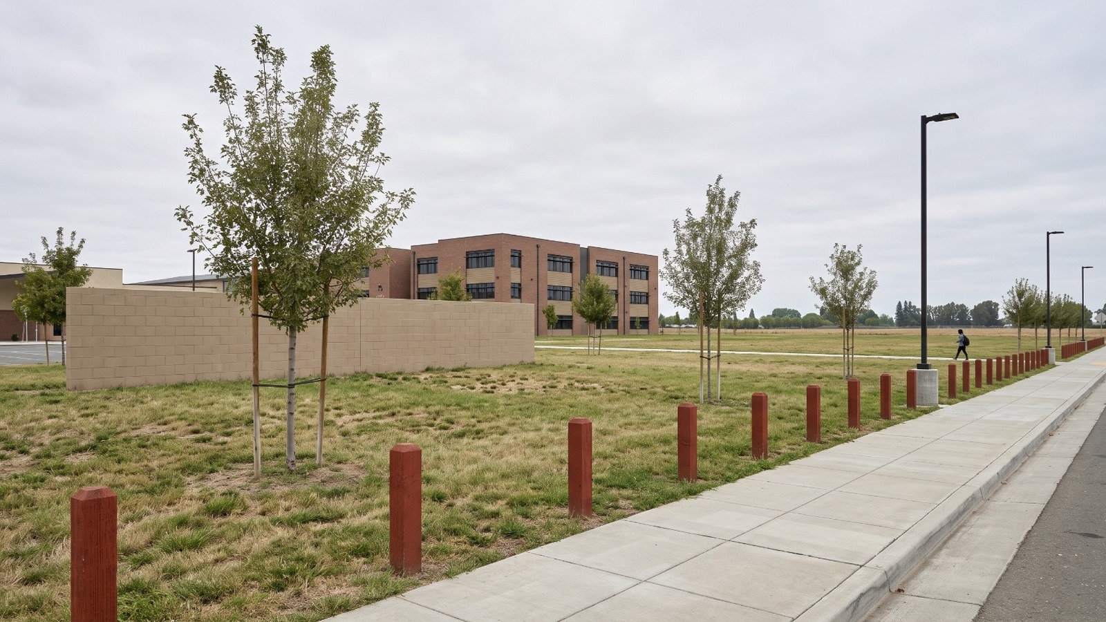 AI-rendered view of the open north lot at West Park High School on Panther Place in Roseville, where the new classroom building and theater will go