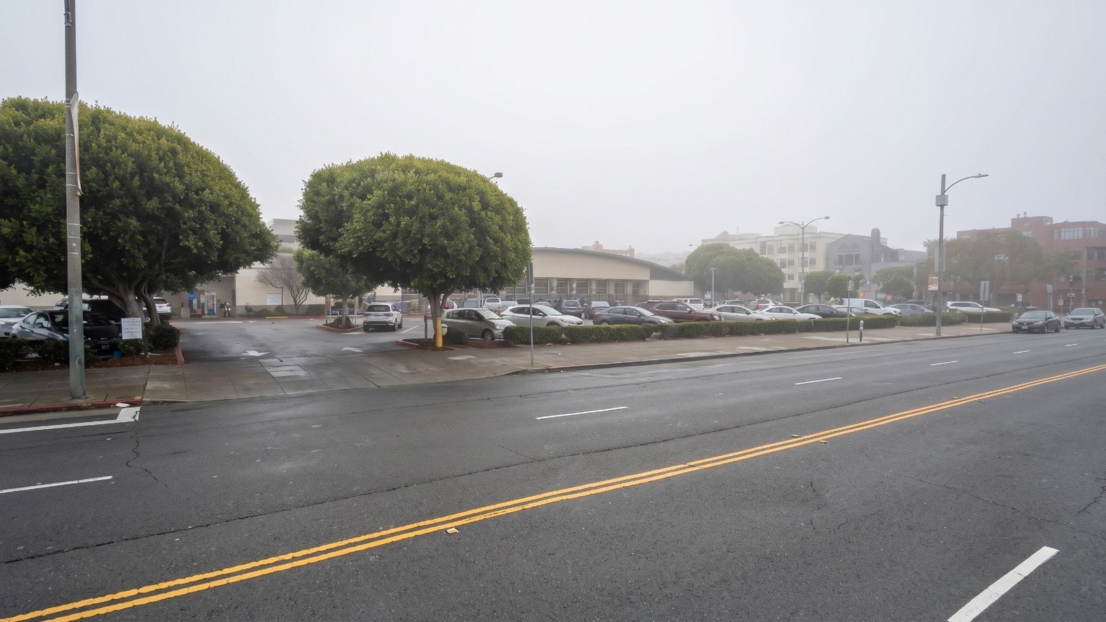 AI-rendered view of Marina Boulevard and the Marina Safeway lot at 15 Marina Boulevard, San Francisco, in fog